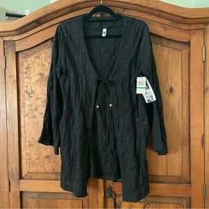 Silhouette Solution black long sleeve cover up.       NWT